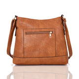 Karenina pocket cross body bag dark tan image 1